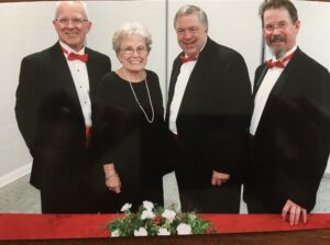 The four tenors are, left to right, Eric Vanderlinden, Jackie Oren, Dwayne Whitmore, and Tim Aland.